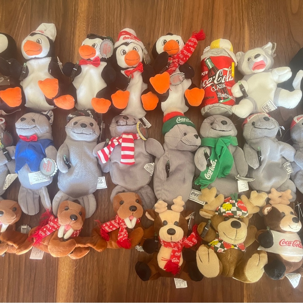 23. Collectible Coca-Cola being bad plush animals. Christmas theme.